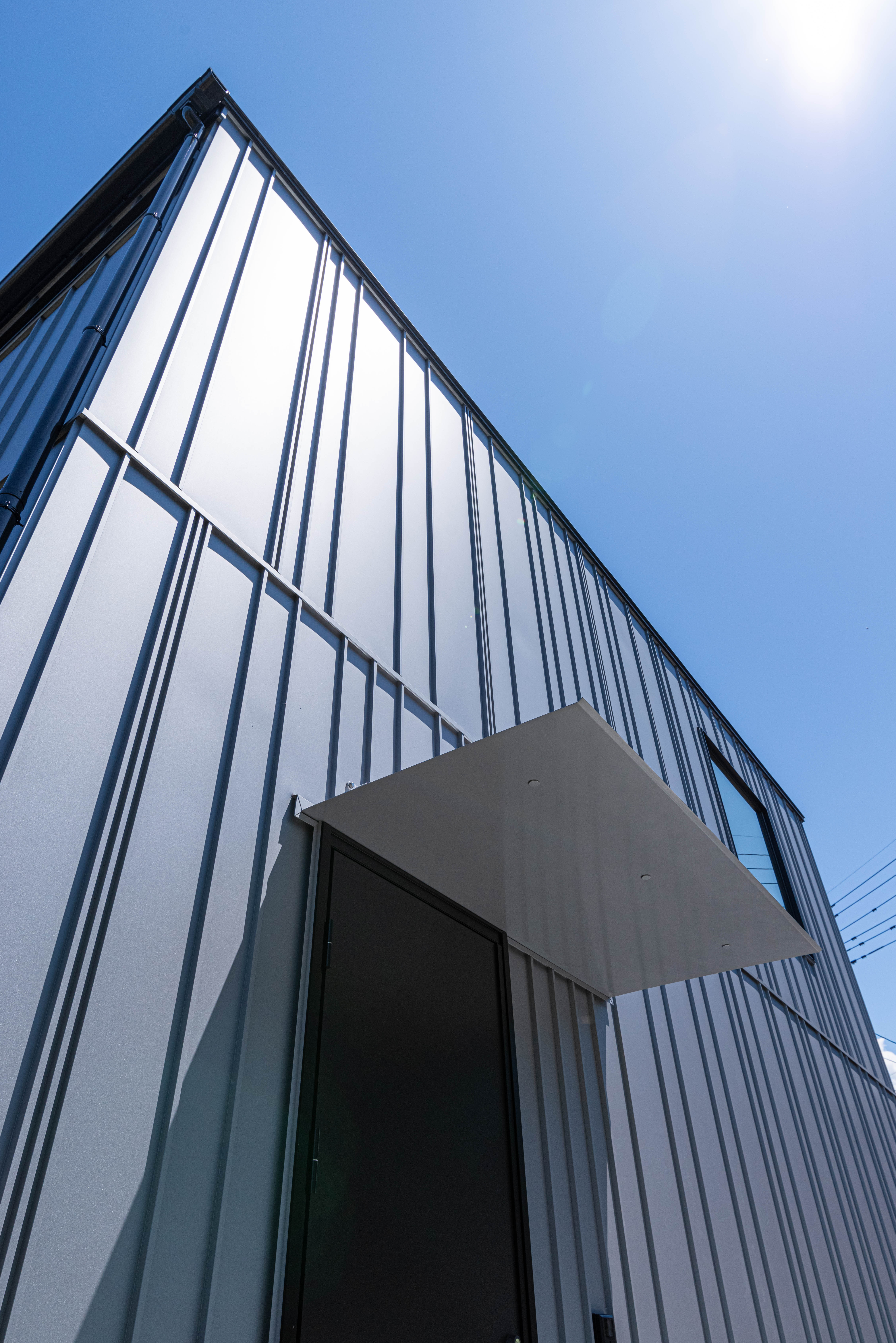 BABEL-1756 ランダム張りは施工図でピッチ管理。職人技が光る外壁です。